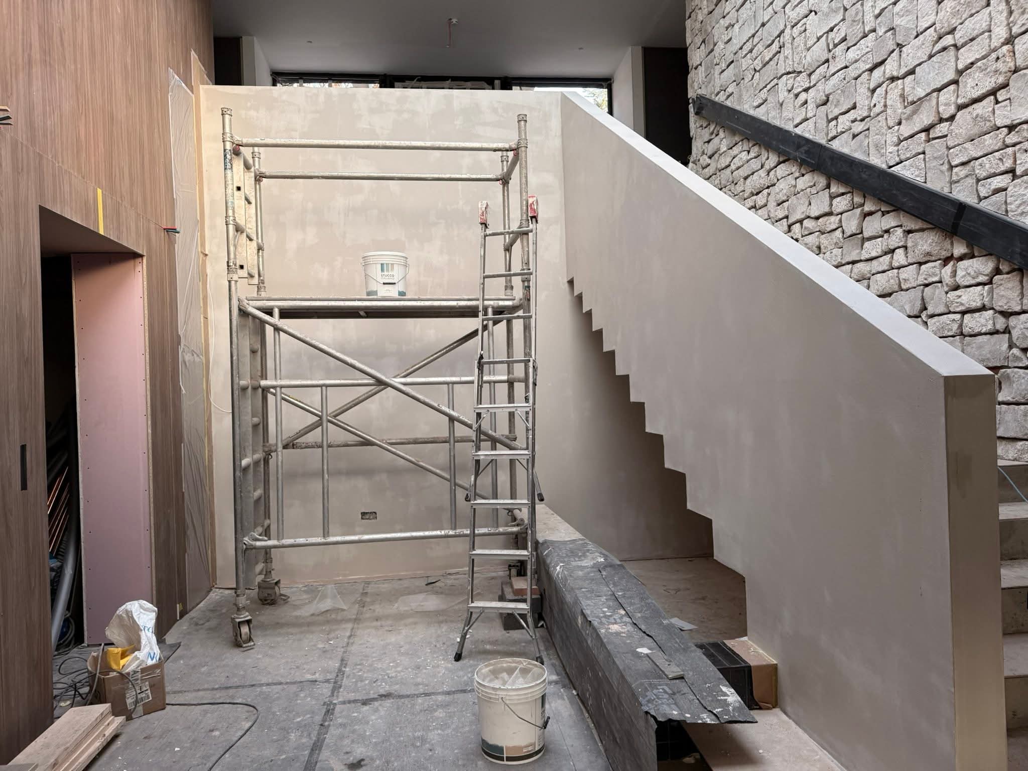 Venetian plaster applied to a luxury staircase feature wall